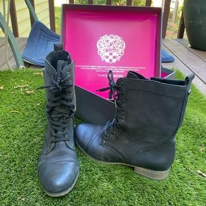 Black leather combat boots